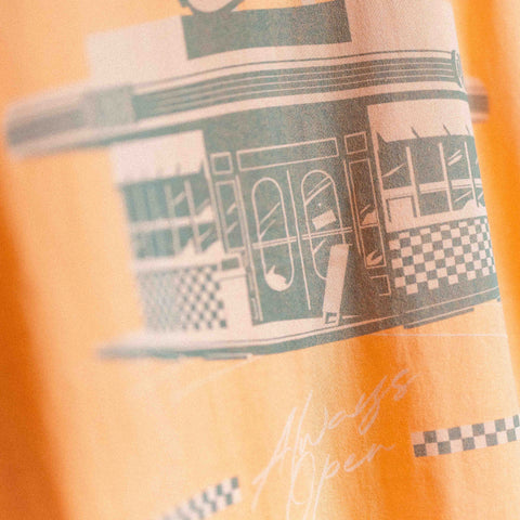 The Flying Saucer Diner Tee In Sunset Orange