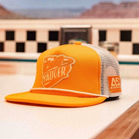 The Flying Saucer Diner Trucker Hat in Sunset Orange
