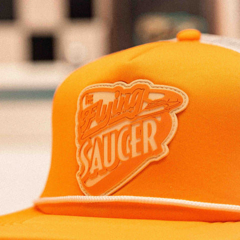 The Flying Saucer Diner Trucker Hat in Sunset Orange