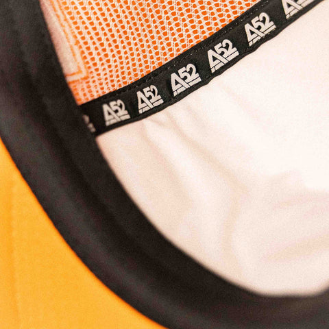 The Flying Saucer Diner Trucker Hat in Sunset Orange