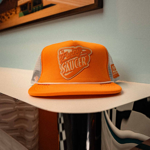 The Flying Saucer Diner Trucker Hat in Sunset Orange