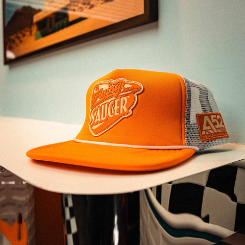The Flying Saucer Diner Trucker Hat in Sunset Orange
